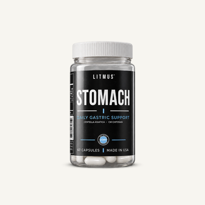 Jar of LITMUS STOMACH, a daily stomach lining supplement with gotu kola and CM chitosan, on an off-white background.